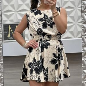 Chic Floral Mini Dress in Black and Cream